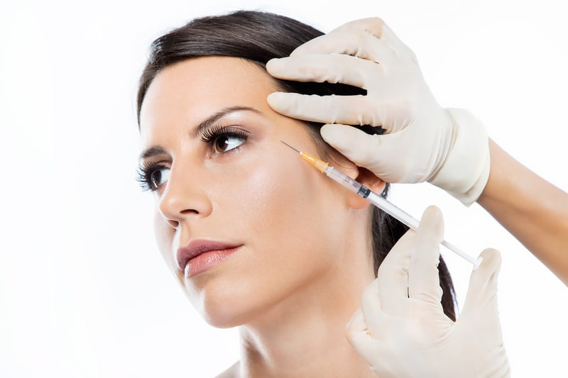 How To Add Medical Aesthetic Services To Your Business 7 Cosmetic Botox Injection Near The Temple And Eye Area During Facial Aesthetic Treatment