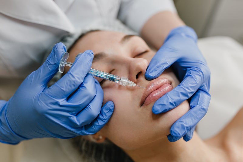 How To Add Medical Aesthetic Services To Your Business 1 Close-Up Portaint Of A Young Woman Getting Botox In Her Lips