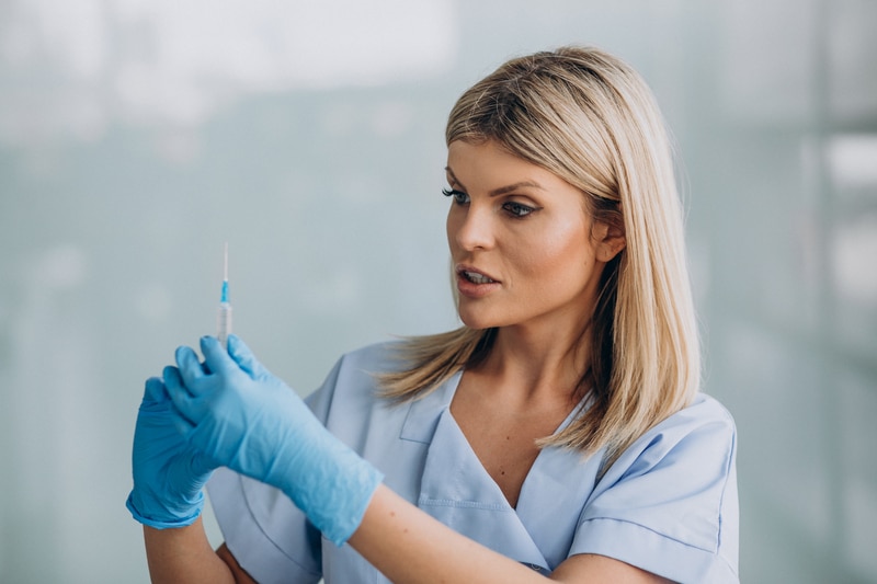 Female Dentist With Prick Hands