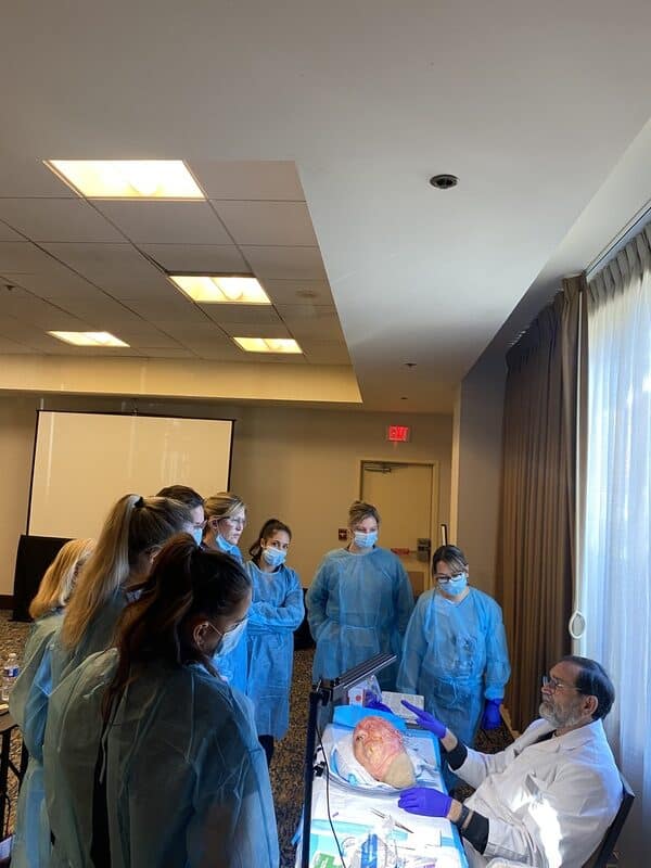 Masseter Botox Gone Wrong 6 Aafe Clinical Facial Esthetics Training Session Showing Instructor Demonstrating Anatomy Assessment To Dental And Medical Professionals